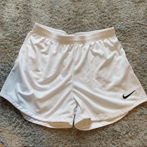 White Nike shorts